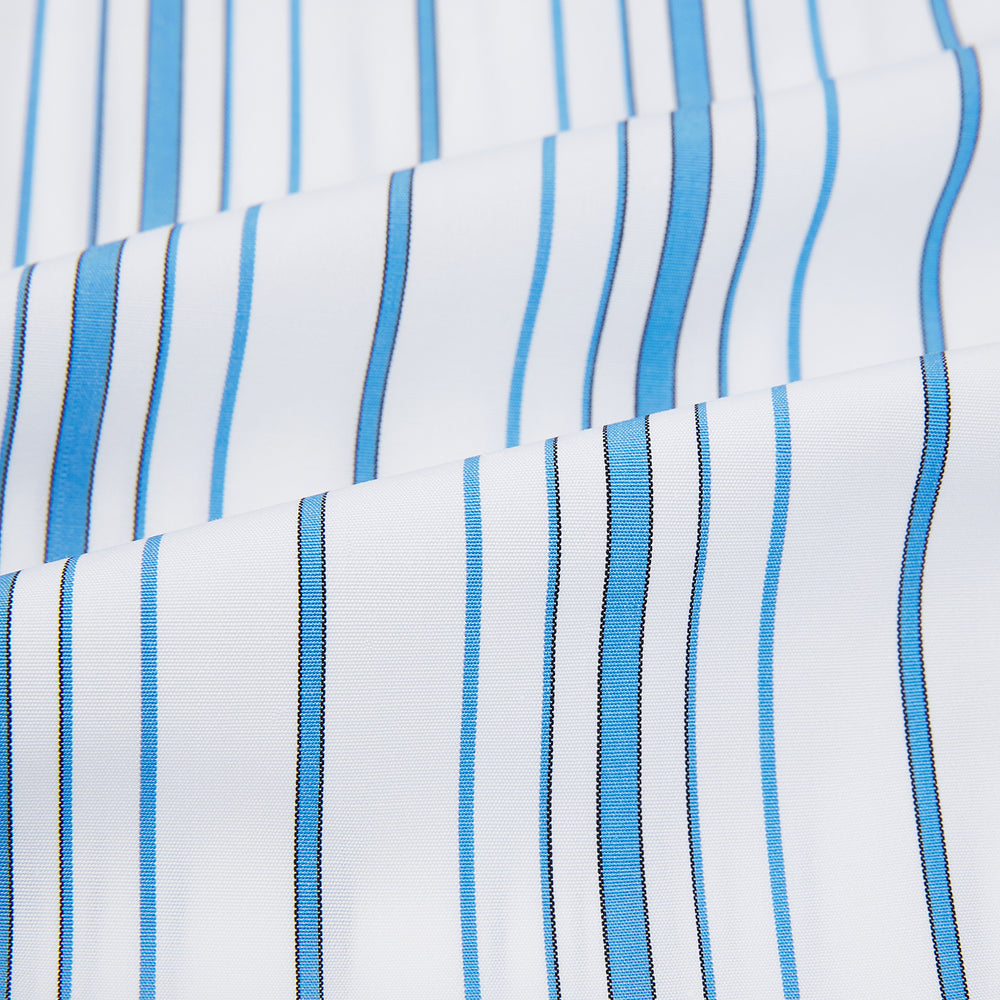 The Turnbull & Asser Blue Multi Stripe Mayfair Shirt features a T&A collar, vertical blue and white stripes, long sleeves, and a crisp Mayfair fit for a refined look.