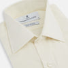 View 2 of product The Turnbull & Asser Tomorrow Never Dies Cream Cotton Hamburg Shirt, as seen on James Bond, features a long sleeve, button-down front, and collar. It's laid flat on a white background.