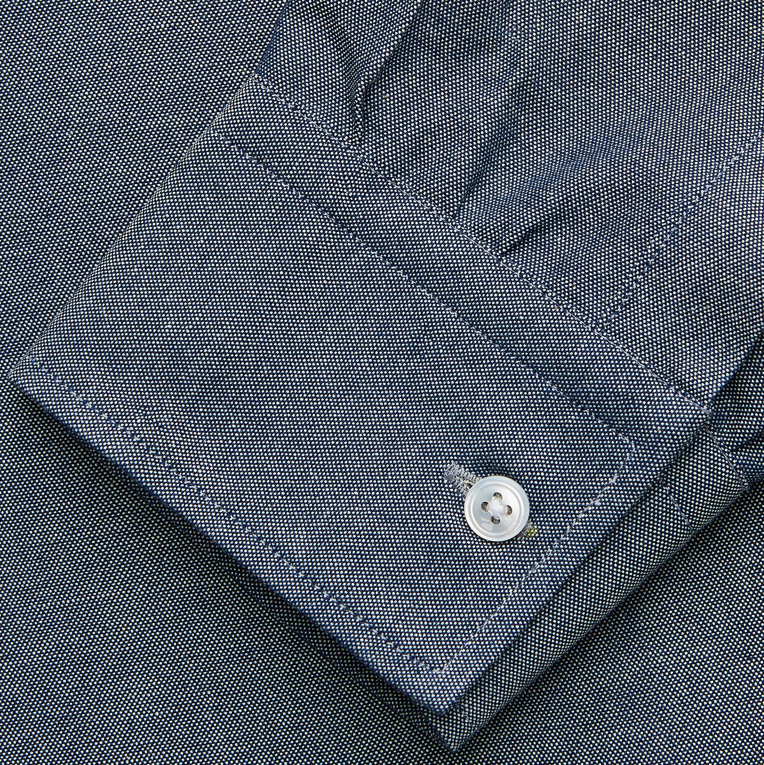 View 4 of product The Turnbull & Asser Blue Weekend Fit Oxford Finch Shirt features a Derby collar, chest pocket, white buttons, and classic fit—part of the Weekend Fit shirts collection—laid flat on a white background.