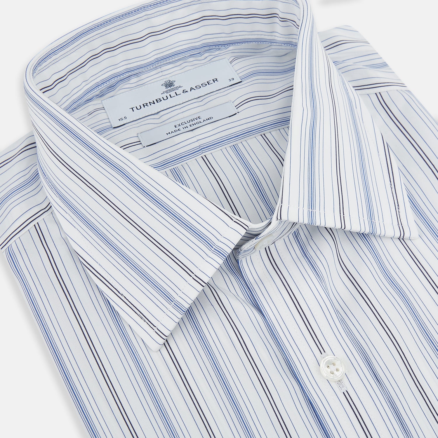 View 2 of product The Turnbull & Asser Navy and Blue Multi Stripe Mayfair Shirt features long sleeves, a T&A collar, and buttoned cuffs, shown against a white background.