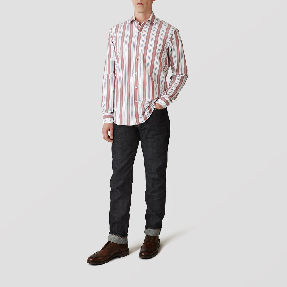 The Turnbull & Asser Red, Blue & White Stripe Weekend Fit Shirt features a Derby collar, 1-button cuffs, and crisp stripes—ideal for stylish winter layering.