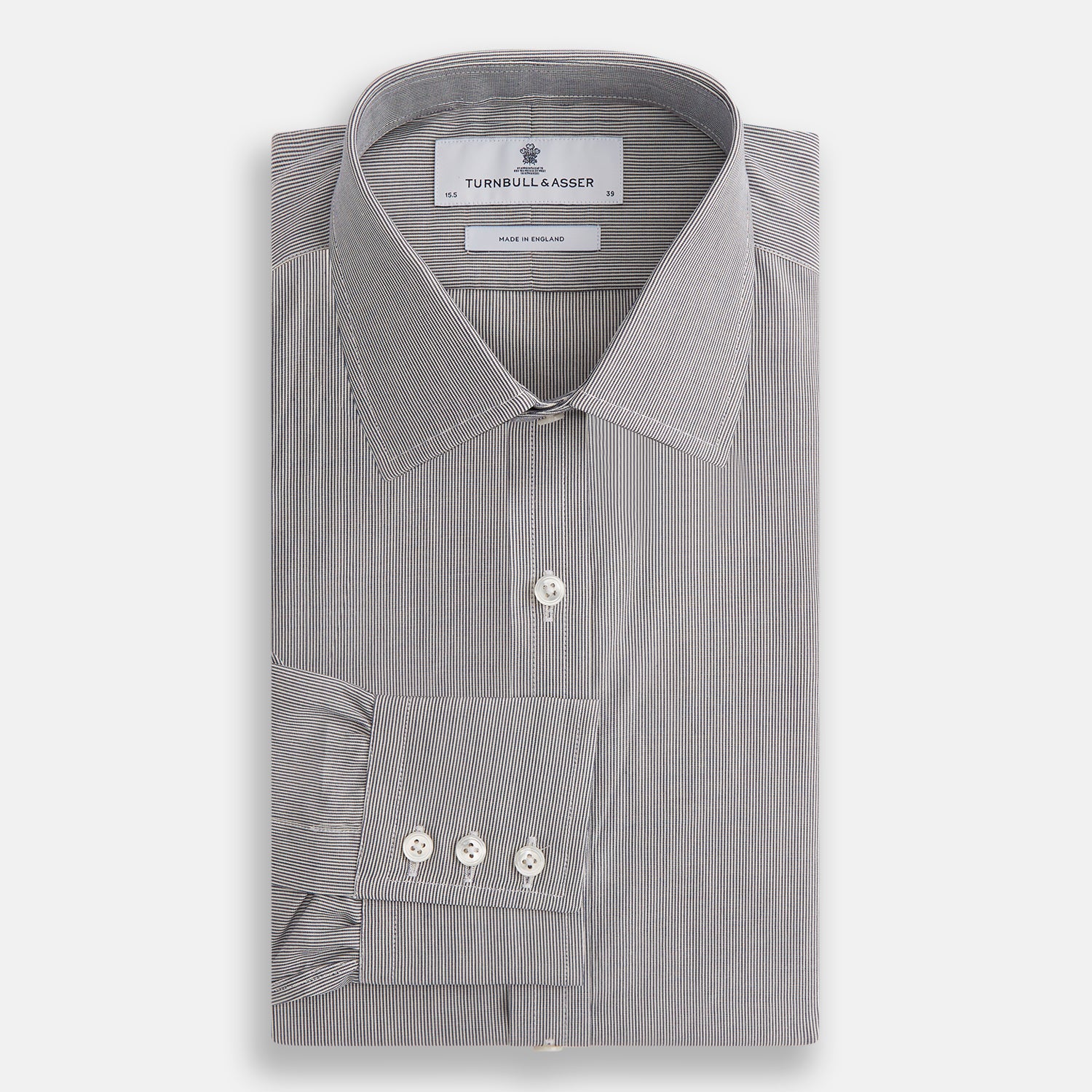 View 5 of product The Turnbull & Asser Navy Fine Stripe Mayfair Shirt, a long-sleeve, button-up with a classic collar, features fine navy stripes and white buttons, shown laid flat on a white background.