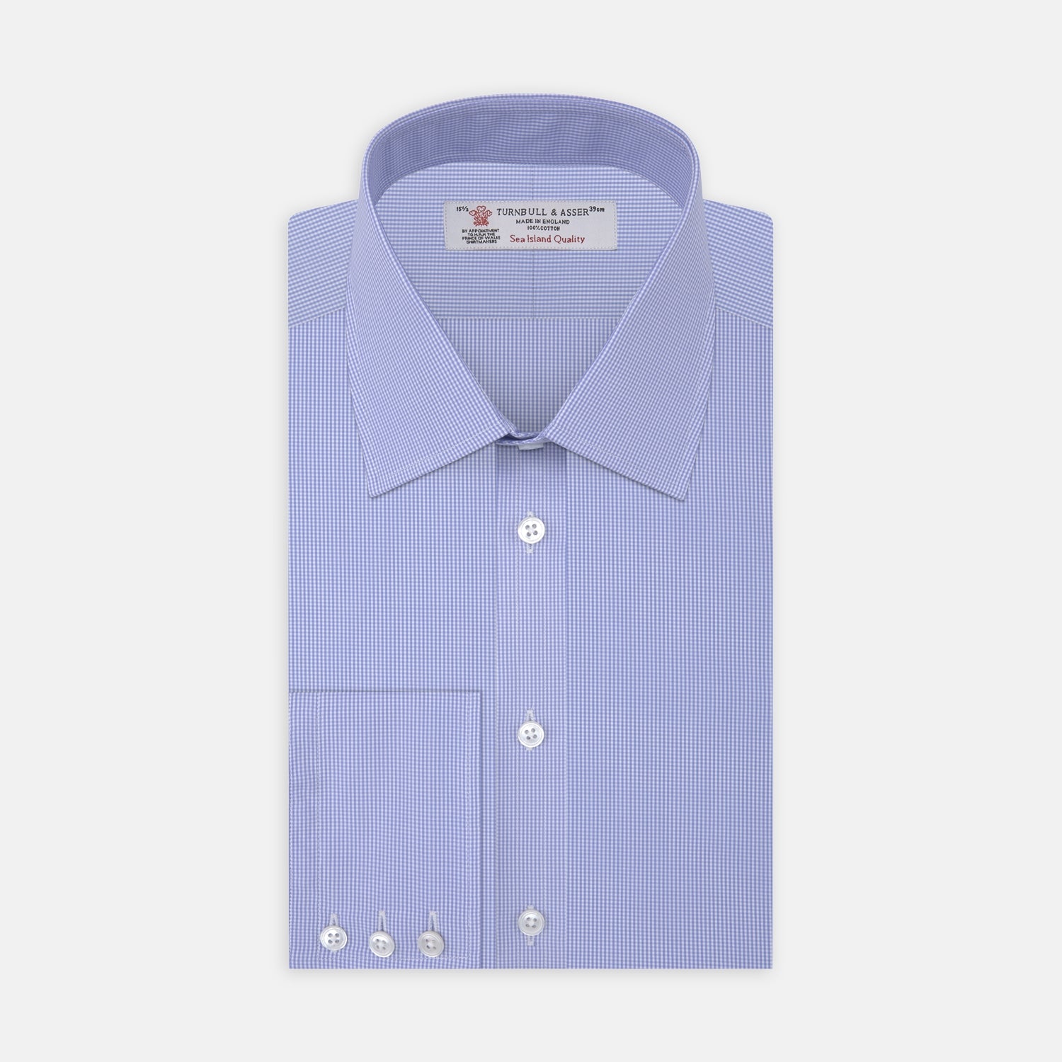 Image 1 of product Turnbull & Asser's Blue Fine Check Sea Island Quality Cotton Shirt features a T&A collar, 3-button cuffs, and white buttons, all neatly folded and displayed on a plain white background.