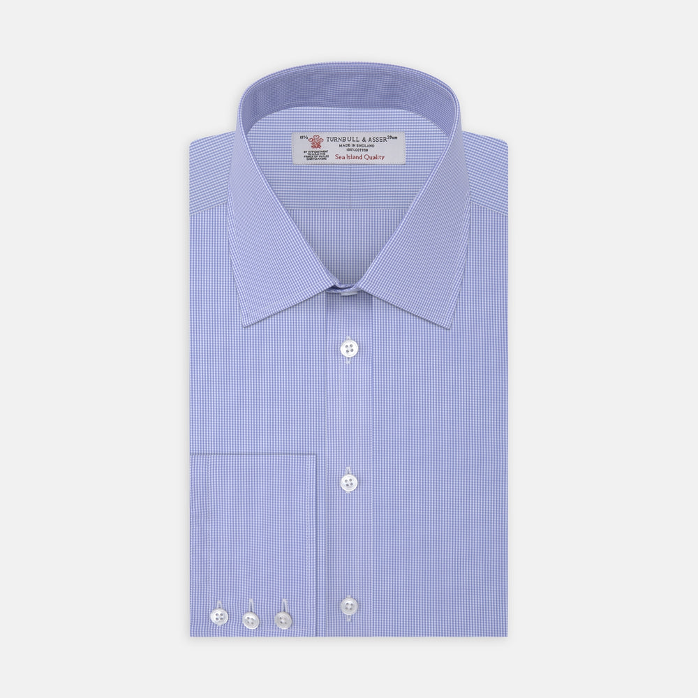 Turnbull & Asser's Blue Fine Check Sea Island Quality Cotton Shirt features a T&A collar, 3-button cuffs, and white buttons, all neatly folded and displayed on a plain white background.
