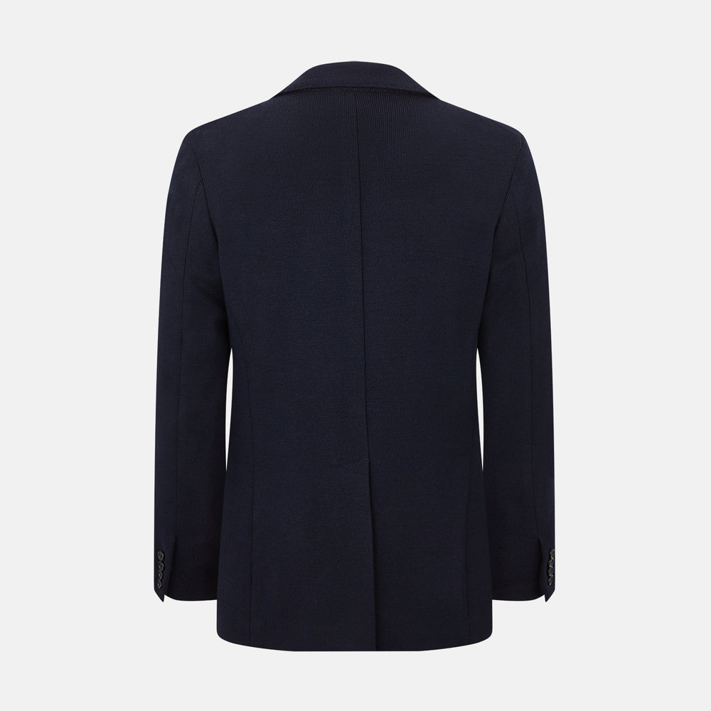 The Navy Knitted Oxford Blazer by Turnbull & Asser features notch lapels, two front buttons, a chest pocket, and two lower patch pockets, shown against a plain white background.