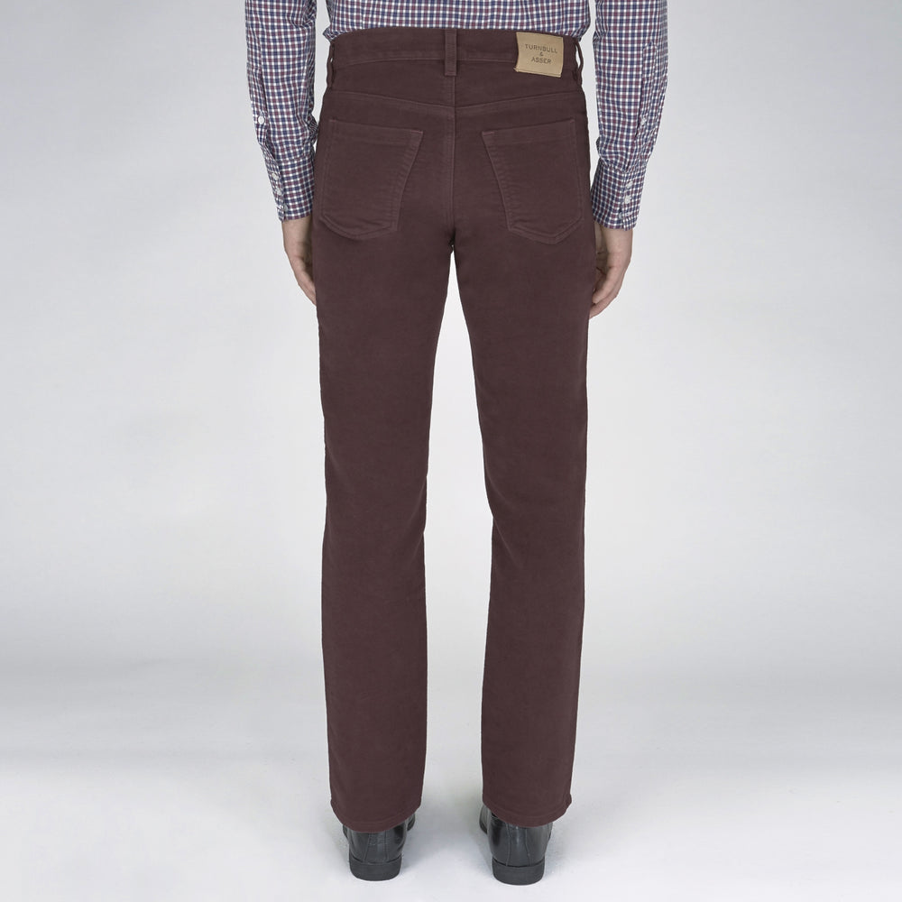 A pair of Purple 5 Pocket Jeans by Turnbull & Asser, featuring a straight-leg, high-waisted design with front and back pockets, displayed against a plain white background.