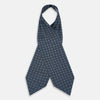 View 2 of product The Turnbull & Asser Navy Medallion Silk Cravat features a white geometric and circular pattern, its classic design and rich navy hue echoing refined British elegance.