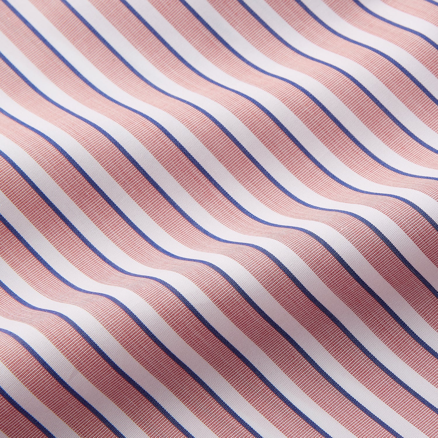 View 2 of product The Orange Multi Stripe Cotton Sussex Nightshirt by Turnbull & Asser features a classic collar, red and white vertical stripes, a chest pocket with blue trim, button-down front, and curved hem—a luxe take on the traditional nightshirt.
