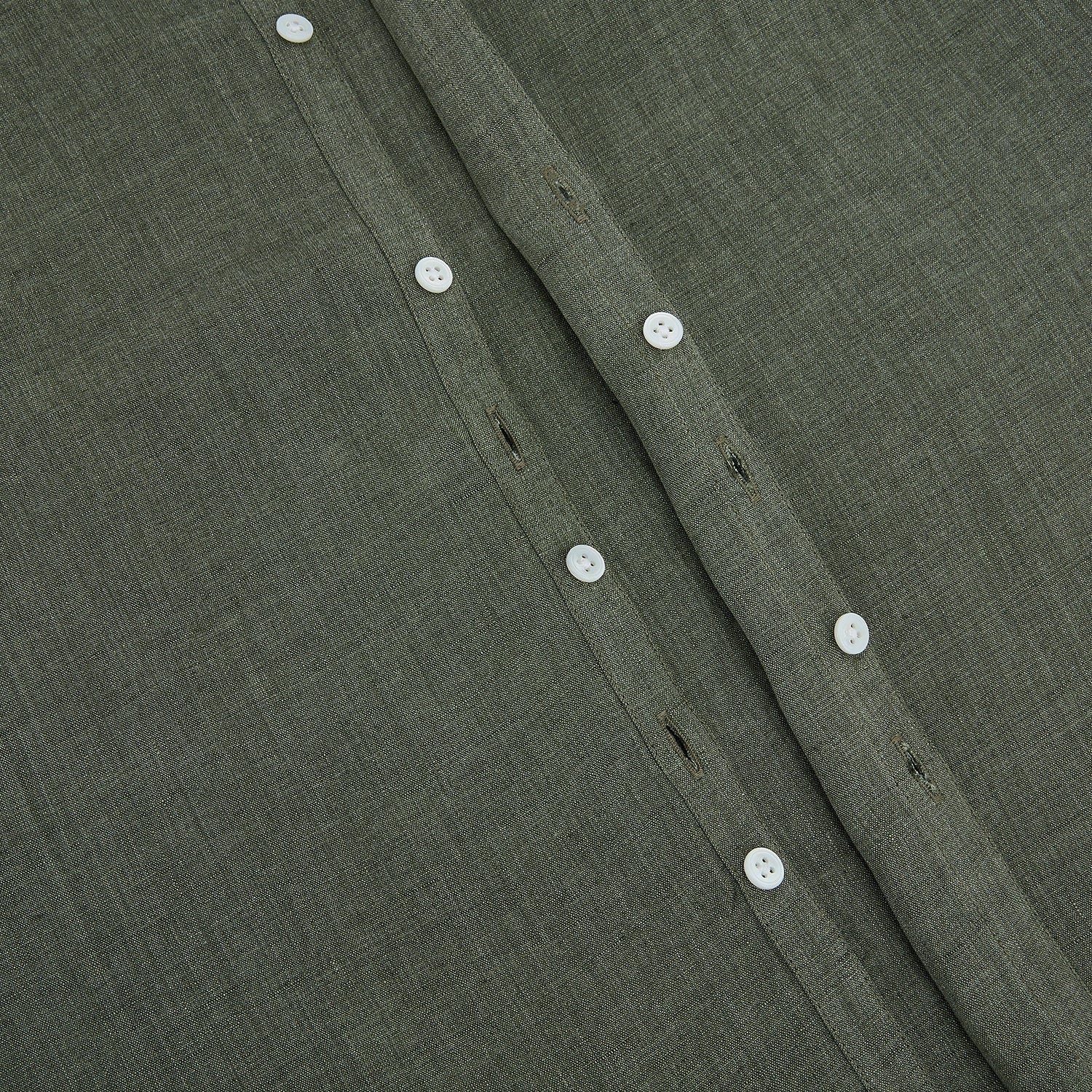 View 7 of product The Sage Linen Westminster Shirt by Turnbull & Asser features long sleeves, a button-up front with white buttons, a pointed Turnbull collar, and buttoned cuffs—crafted in Britain and shown here against a plain white background.