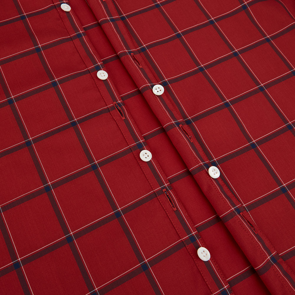 The Turnbull & Asser Dark Red Grid Check Windsor Shirt is a long-sleeved, button-up shirt with a dark red base and black and white grid pattern, displayed flat on a white background.