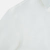 View 6 of product The Turnbull & Asser Plain White Windsor Shirt features a Turnbull open collar, 3-button cuffs, and relaxed fit—exemplifying British craftsmanship. Displayed on a white background.