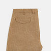 View 5 of product The Turnbull & Asser Camel Striped Linen Edmund trousers feature a straight-leg fit, button and zipper closure, belt loops, and pockets, crafted from lightweight summer fabric and shown against a white background.