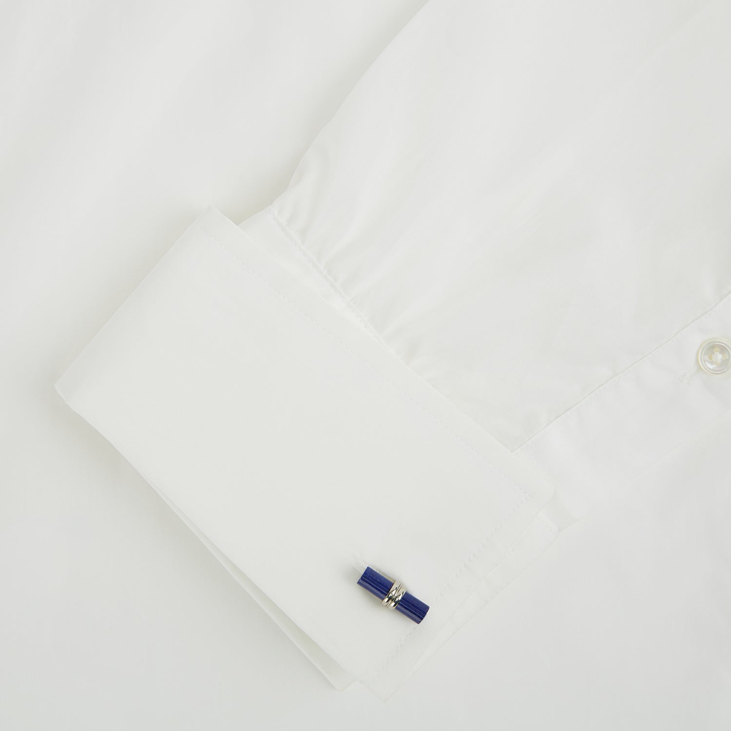 View 3 of product Turnbull & Asser’s Lapis Lazuli Handlebar Cufflinks feature sterling silver with cylindrical lapis lazuli bars, shown on a white background.