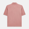 View 3 of product The Turnbull & Asser Red Polo Shirt is a men's cotton polo with short sleeves, a collar, a three-button neckline, and a buttoned chest pocket. The shirt is shown laid flat on a white background.