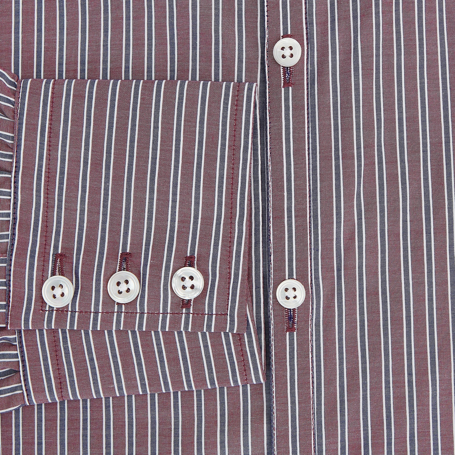 Image 4 of product The Turnbull & Asser Wine Ticking Stripe Westminster Shirt features red, blue, and white vertical pinstripes on white and is shown laid flat on a white surface.