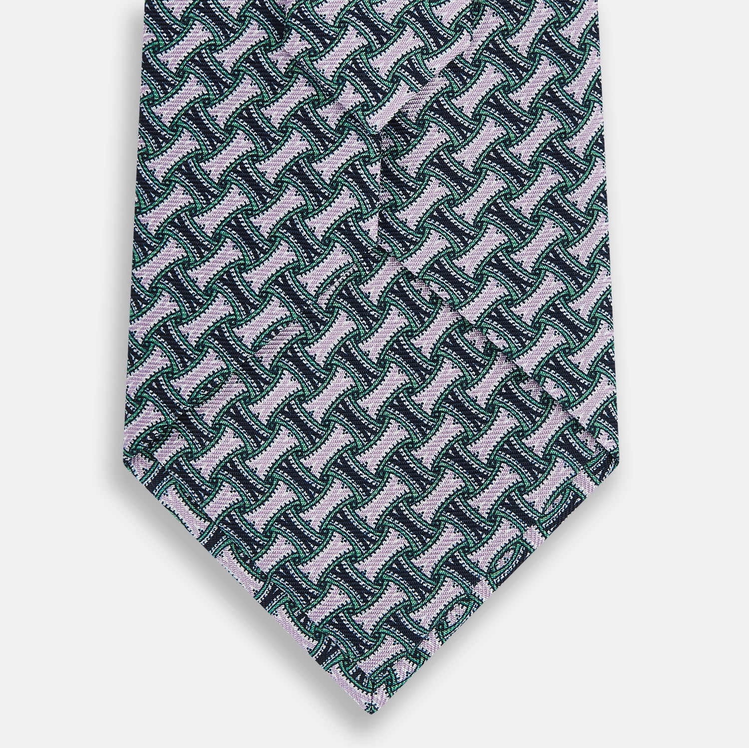 View 3 of product The Turnbull & Asser Lilac and Kelly Weave-Patterned Printed Silk Tie features an elegant geometric design in green, white, and pink on a white background, crafted from English silk with a textured look and classic pointed end.