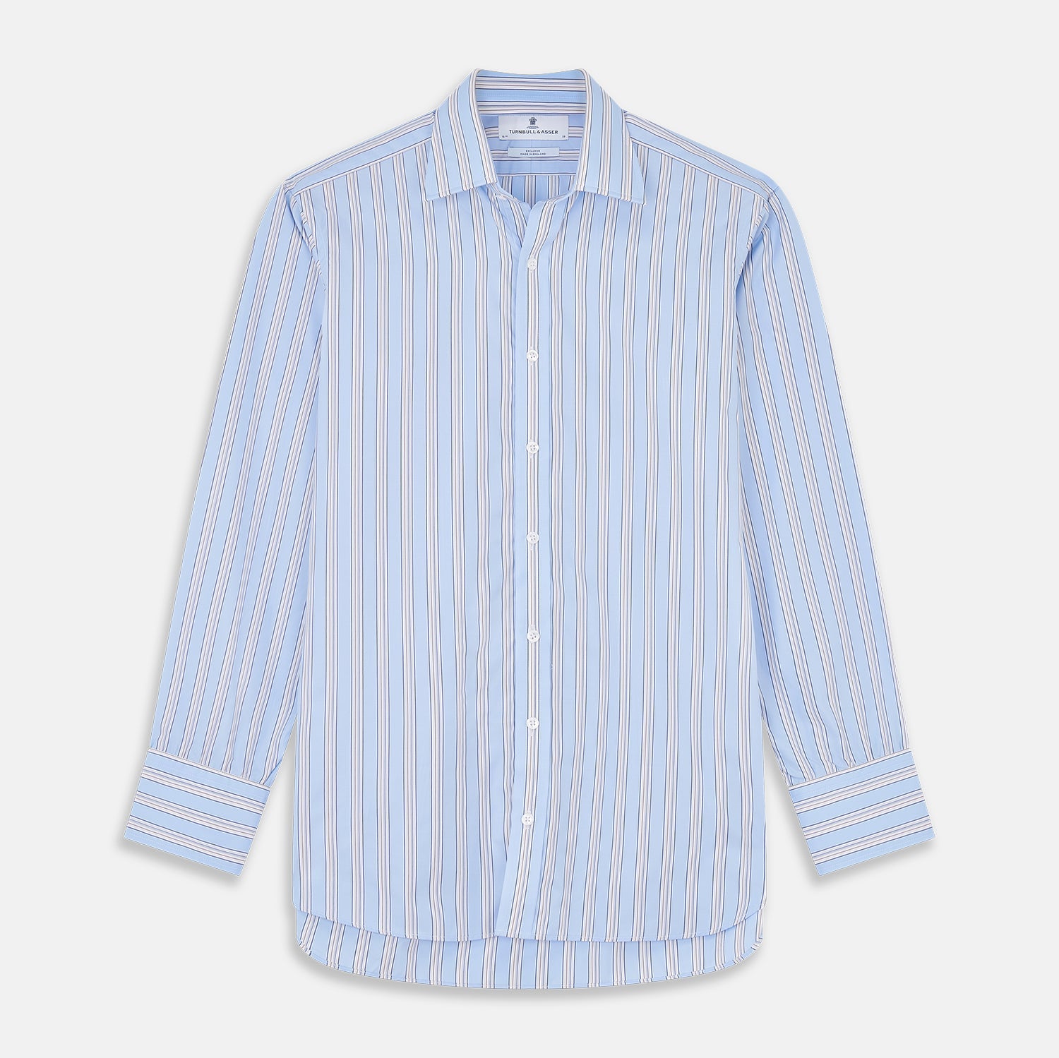 View 2 of product Close-up of Turnbull & Asser's Pale Blue Multi-stripe Cotton Fabric, featuring diagonal white, navy, and tan stripes displayed in a circular frame against a plain white background.