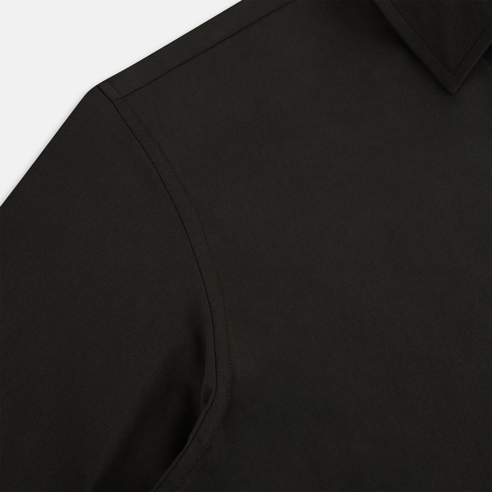 A brown Windsor long-sleeve button-up shirt by Turnbull & Asser with a classic collar, buttoned cuffs, and a straight hem, laid flat on a white background—showcasing refined British craftsmanship.