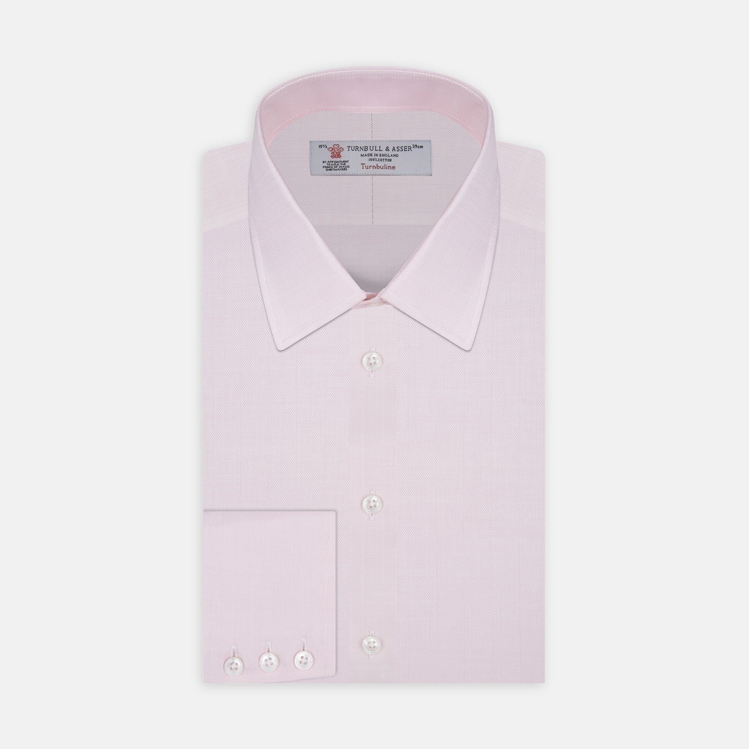 View 2 of product Close-up of Turnbull & Asser's Pink Herringbone Cotton Fabric, featuring a subtle herringbone pattern, displayed in a circular frame on a light gray background.