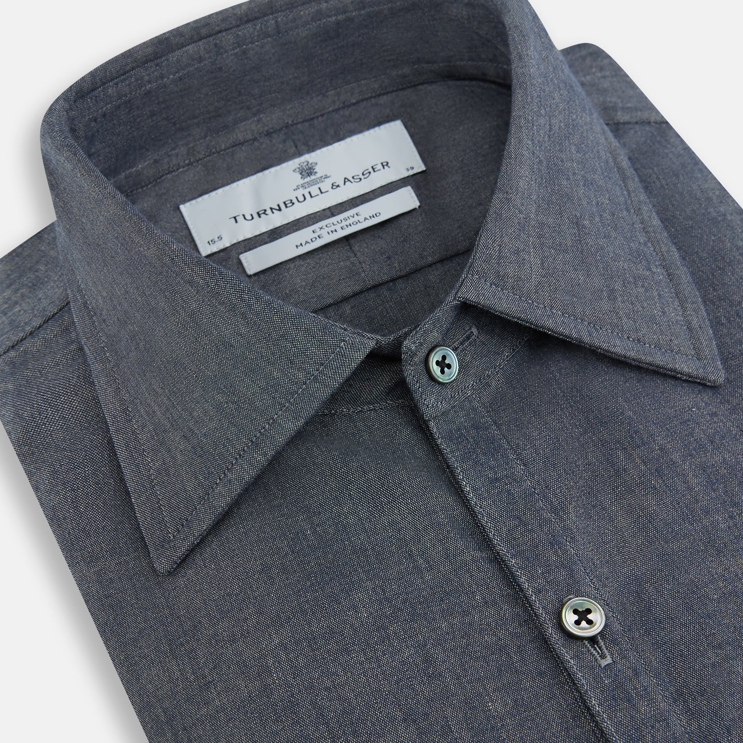 View 2 of product The Turnbull & Asser Azzurro Westminster Shirt in dark grey features long sleeves, a classic collar, buttoned cuffs, and a straight hem, showcased against a white background, highlighting refined British craftsmanship.