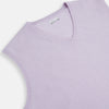 View 2 of product The Turnbull & Asser Lilac Cashmere V-Neck Vest is a sleeveless knit with a ribbed hem, showcasing sophisticated style in light purple against a plain white background.