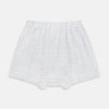 View 2 of product Turnbull & Asser Pink Grid Check Godfrey Boxer Shorts, crafted from Italian cotton with an elastic waistband, feature a pink grid pattern. The luxury boxer shorts are displayed flat against a plain white background.