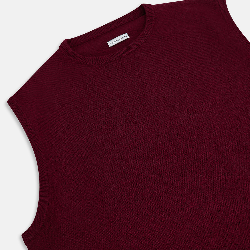 The Turnbull & Asser Burgundy Cashmere Round Neck Vest is a sleeveless jumper with a high crew neckline, shown against a plain white background.
