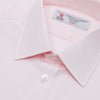 View 2 of product A neatly folded Pink Cotton Shirt with T&A collar and double cuffs by Turnbull & Asser, featuring a classic design with white buttons and an inner label, displayed on a plain white background.