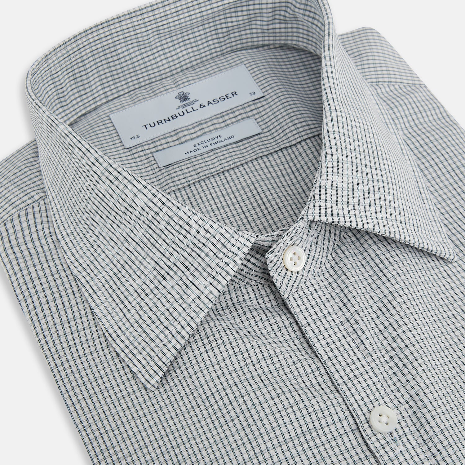 View 2 of product A forest green micro tattersall Westminster shirt by Turnbull & Asser with long sleeves, pointed collar, button-down front, and a tailored fit is displayed flat on a white background.