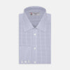 View 2 of product A circular close-up of Turnbull & Asser’s Blue Grid Check Cotton Fabric shows its white base with evenly spaced blue grid lines, bordered by a gray ring on a white background.