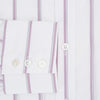 View 4 of product The Turnbull & Asser Antique Pink Track Stripe Mayfair Shirt is a white, long-sleeved Italian cotton shirt with vertical pink stripes, a spread collar, and buttoned cuffs, shown laid flat on a white background.