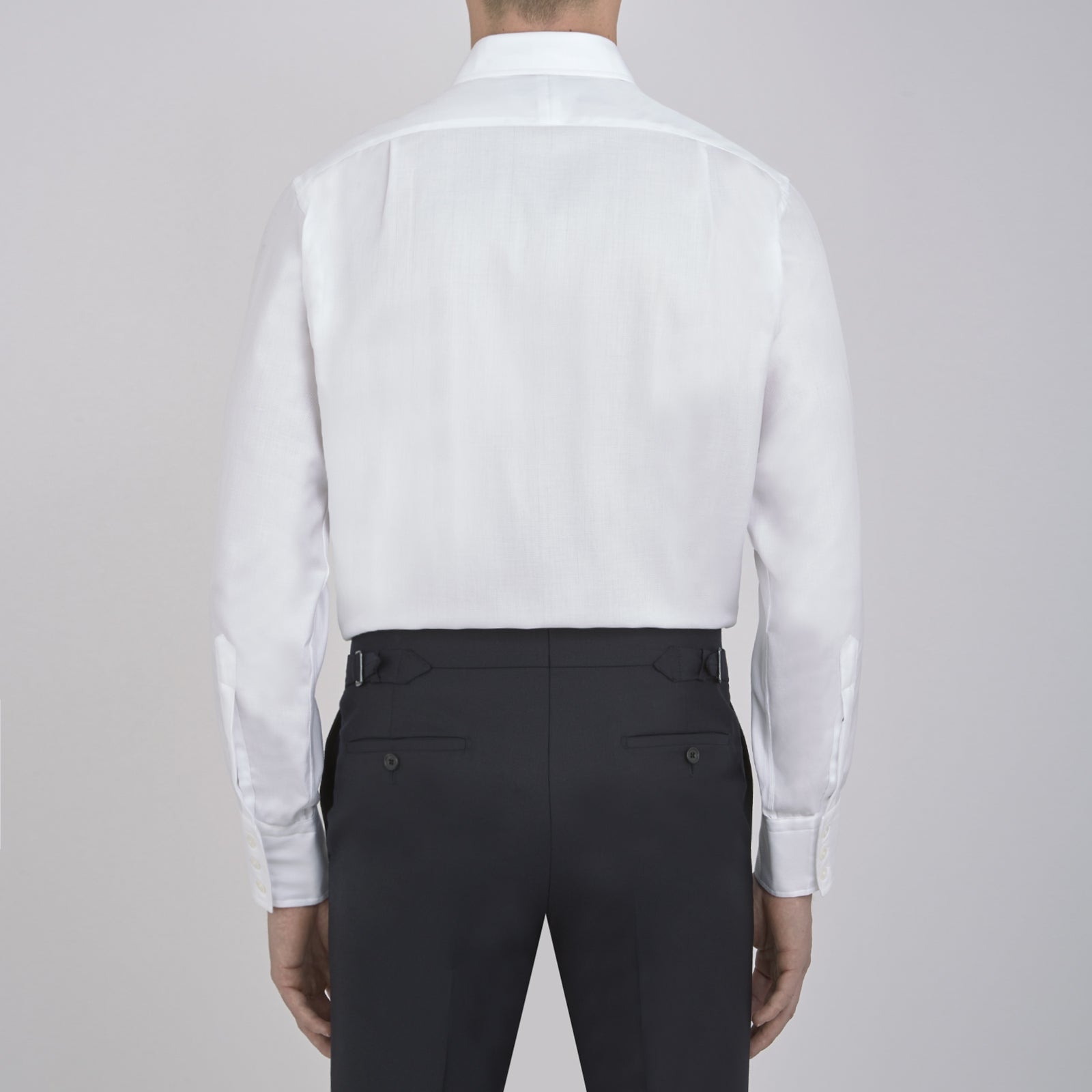 View 5 of product The Turnbull & Asser White Herringbone Superfine Cotton Shirt with T&A collar and 3-button cuffs is perfect for pairing with statement ties or elevating minimalist looks.