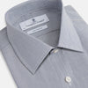 View 5 of product The Blue Fine Stripe Mayfair Shirt by Turnbull & Asser is a long-sleeve button-up with a sharp T&A collar and blue fine stripes, shown flat on a white background.
