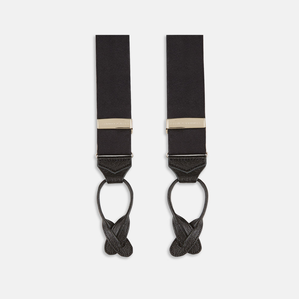 Turnbull & Asser Black Herringbone Adjustable Silk Braces feature leather button loops and silver adjusters—ideal for refined sartorial style. Displayed on a white background.