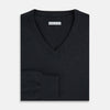 View 4 of product The Turnbull & Asser Dark Green Cashmere V-Neck Jumper features long sleeves, ribbed cuffs, and a ribbed waistband, showcased against a white background.