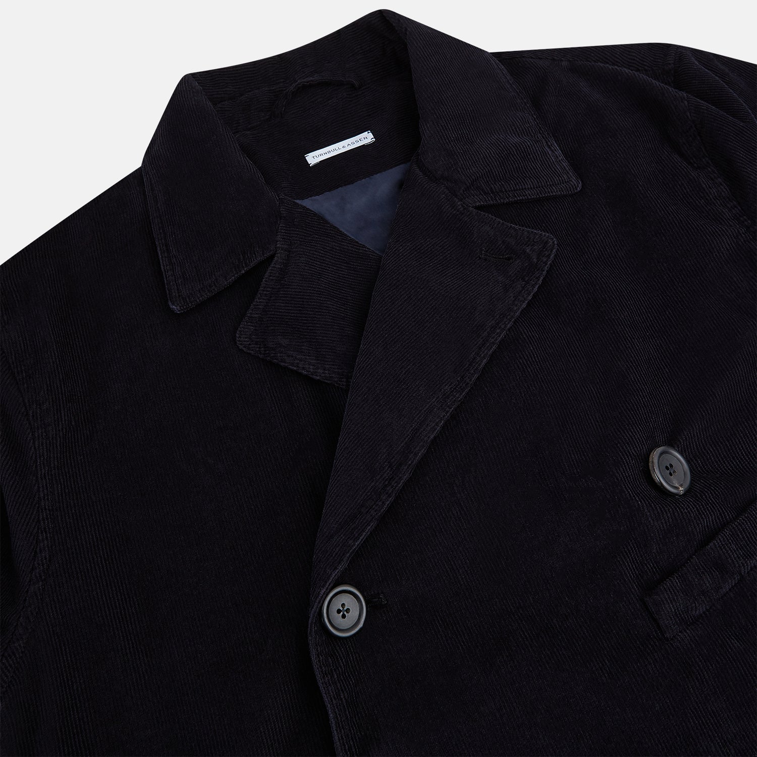 View 2 of product The Navy Kingston Corduroy Caban Jacket by Turnbull & Asser features six front buttons, a notched collar, chest pocket, and buttoned cuffs, showcased against a plain white background.