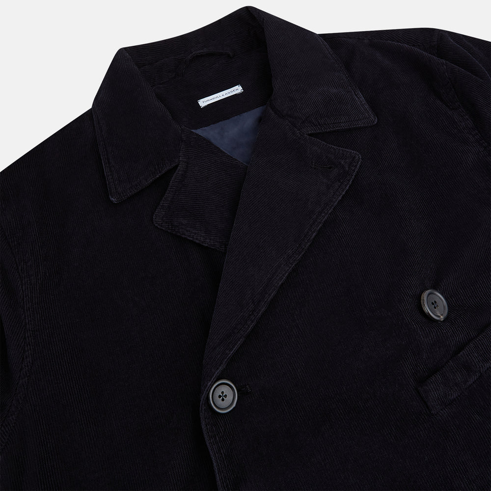 The Navy Kingston Corduroy Caban Jacket by Turnbull & Asser features six front buttons, a notched collar, chest pocket, and buttoned cuffs, showcased against a plain white background.