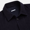 View 2 of product A navy button-up Primrose overshirt by Turnbull & Asser with a classic collar, two side pockets, a left chest pocket, and buttoned cuffs—an ideal blazer alternative, shown on a plain white background.