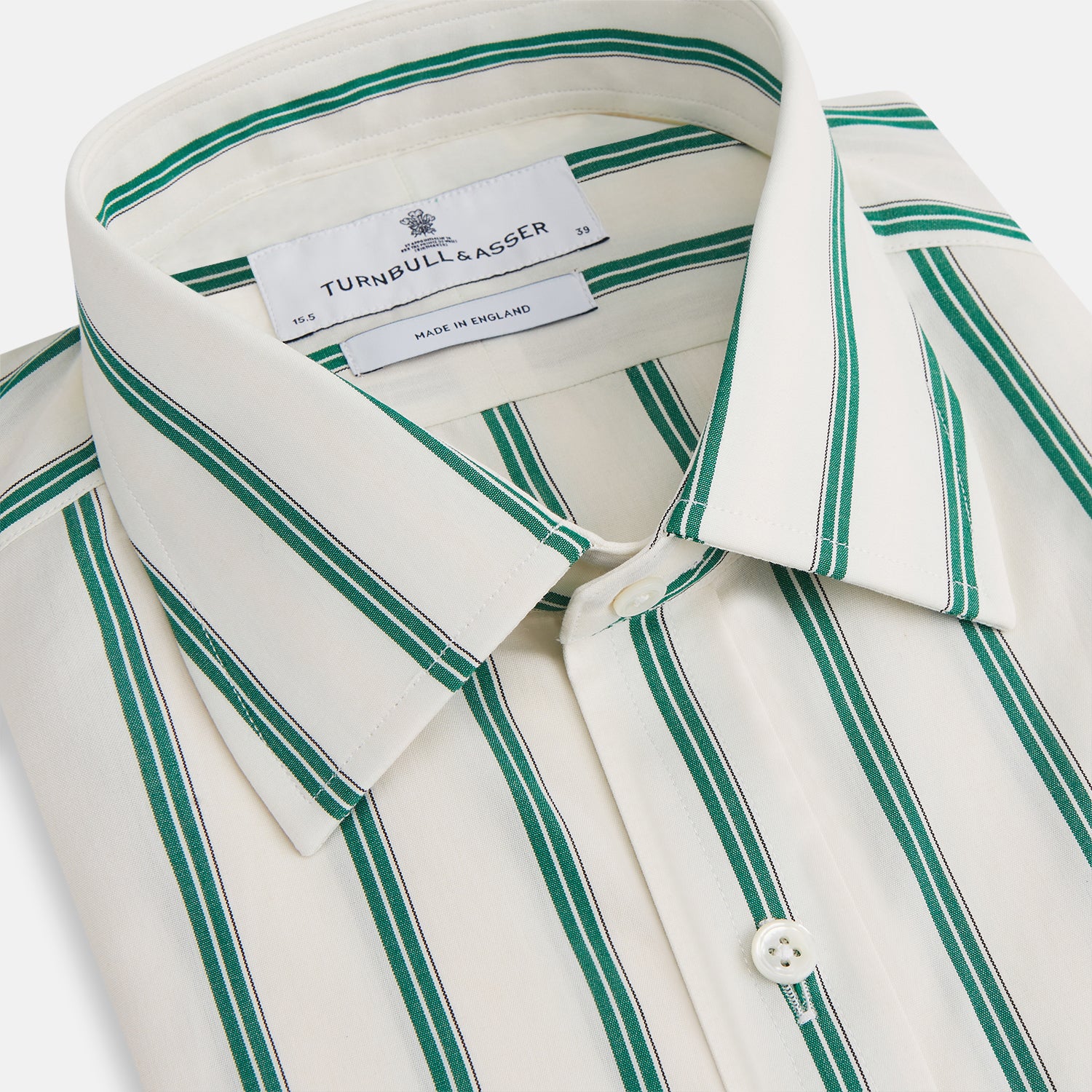 View 2 of product Elevate your wardrobe with the Turnbull & Asser Green Double Track Stripe Mayfair Shirt, crafted from soft organic cotton with a white base, classic collar, and buttoned cuffs—shown against a plain white background.