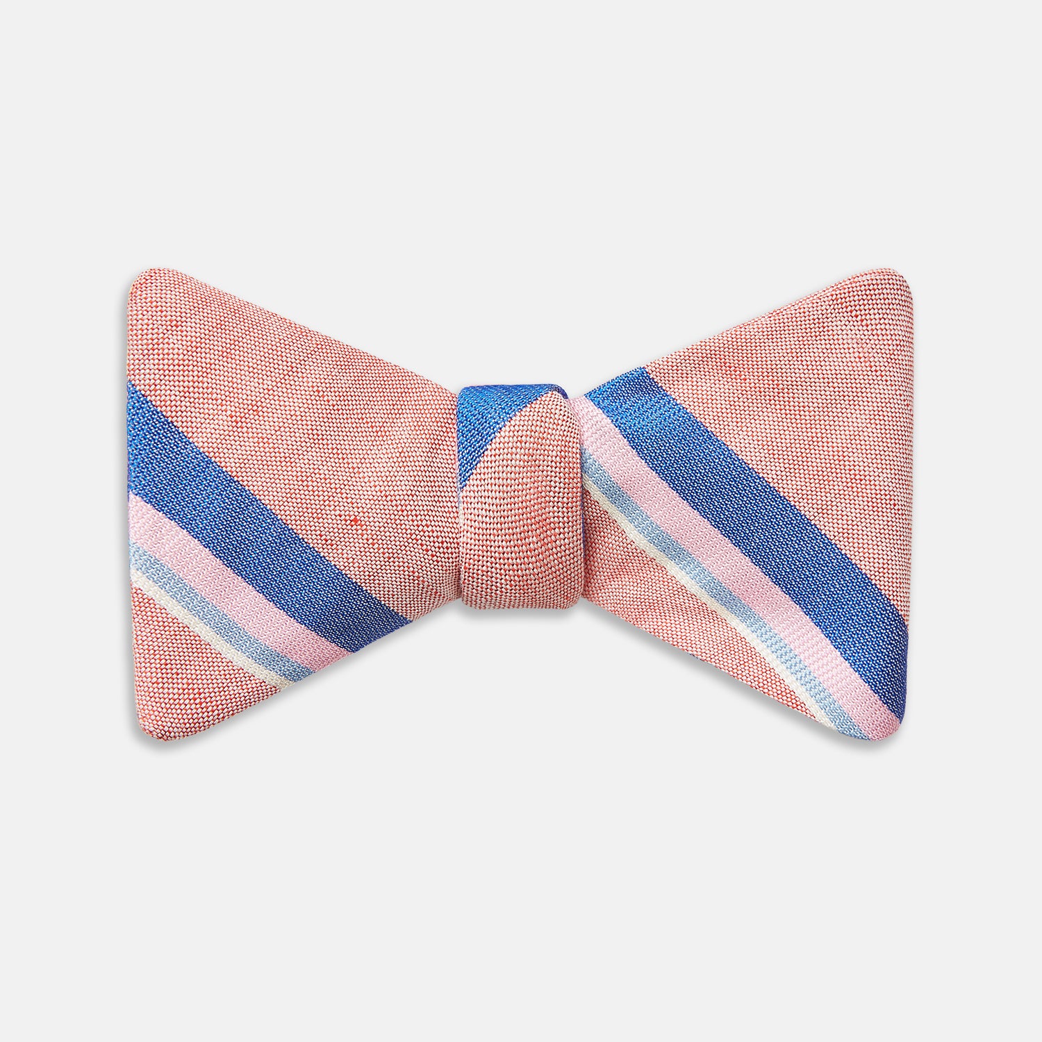 View 1 of product The Thistle-Petersham-Double End Bow Tie by Turnbull & Asser features a pink base with diagonal blue, white, and navy stripes—a versatile accessory perfect for any gentleman's wardrobe.