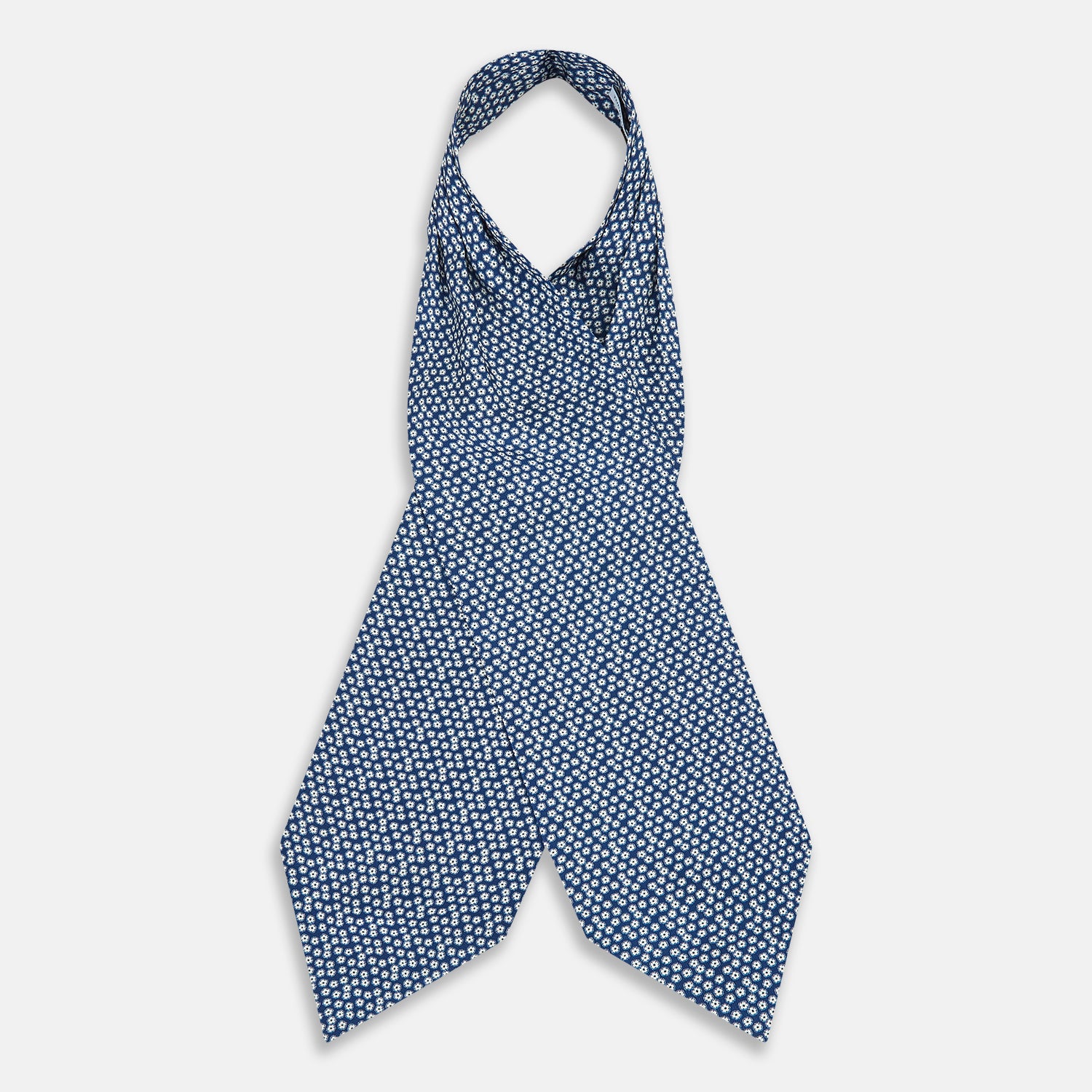 View 2 of product The Azzurro Flower Patterned Silk Cravat by Turnbull & Asser features a classic blue design with small white flowers—a refined British-inspired accessory.