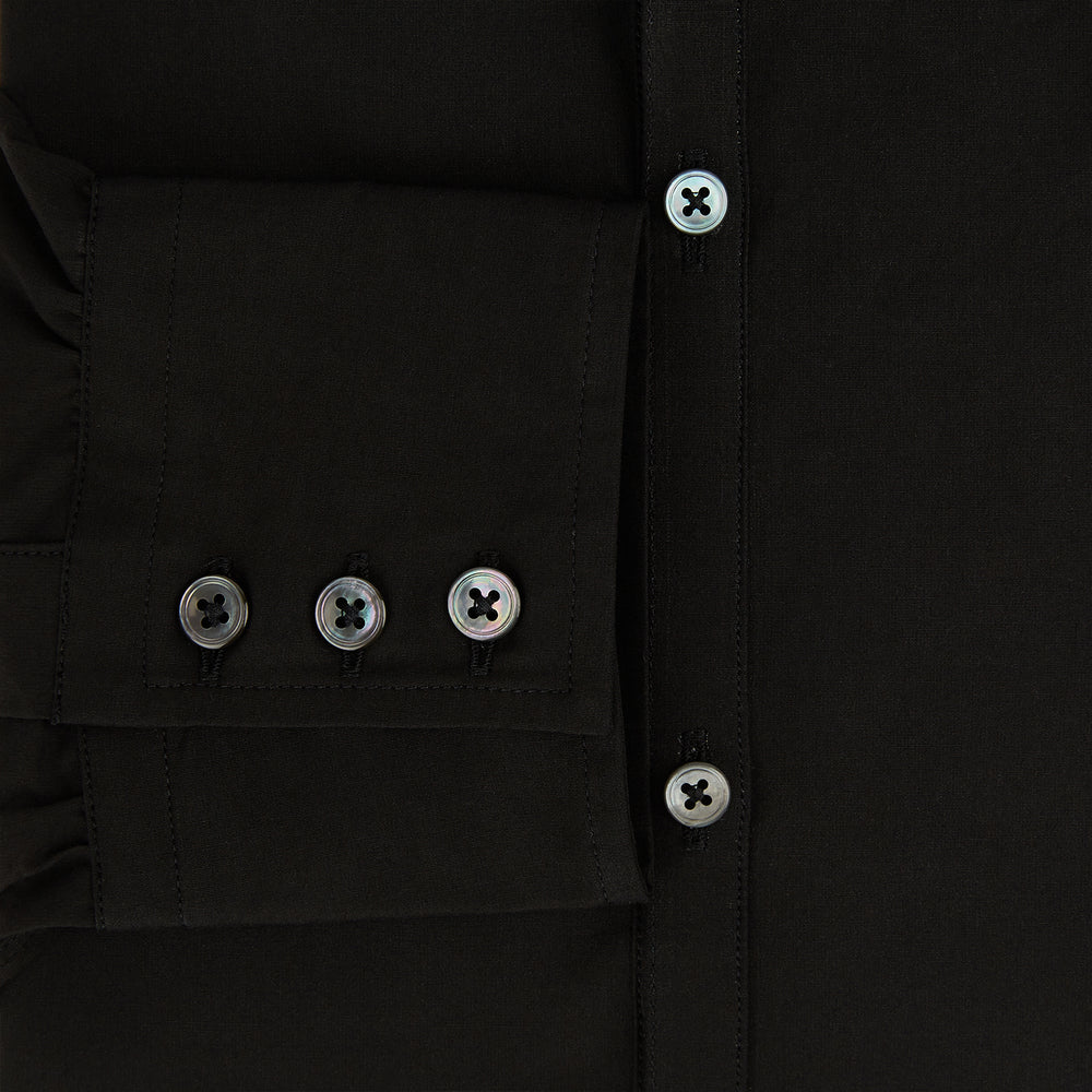 A long-sleeved, collared MIDNIGHT BLUE WINDSOR SHIRT by Turnbull & Asser, laid flat on a white background, highlights classic British craftsmanship.