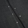 View 7 of product The Ash Linen Windsor Shirt by Turnbull & Asser is a long-sleeve, button-up black shirt with a Windsor collar and cuffs, reflecting British craftsmanship, shown on a plain white background.