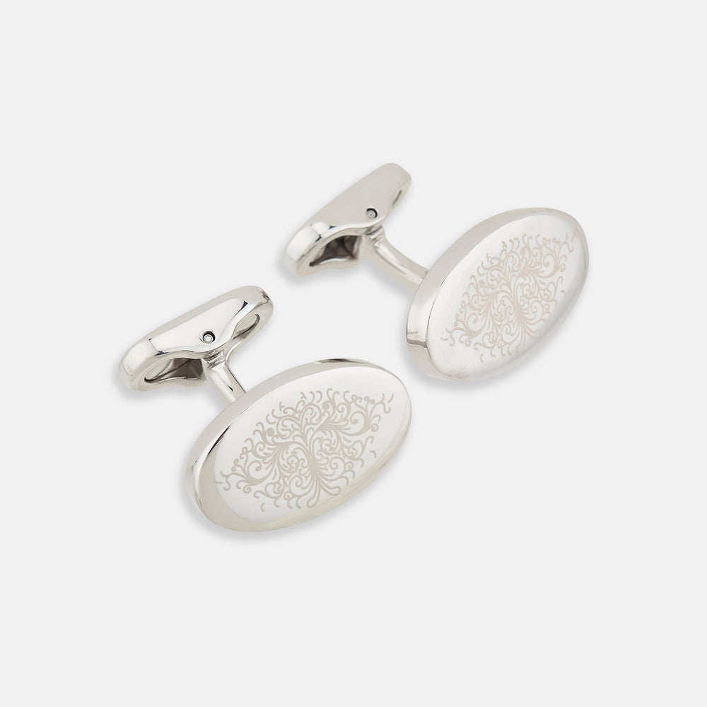 Turnbull & Asser Silver Antique Floral Oval Cufflinks feature engraved floral designs on oval faces, shown against a white background.