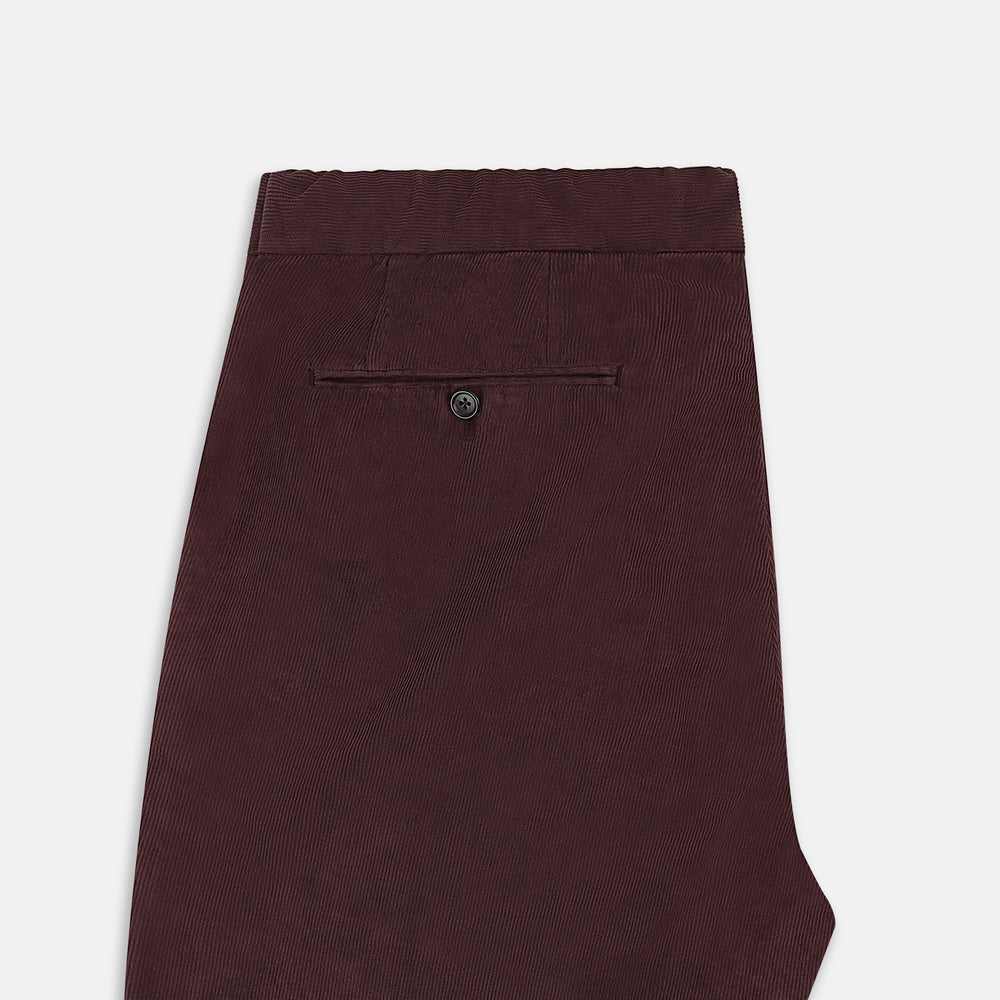 Turnbull & Asser Burgundy Corduroy Miles Trousers: high-waisted, straight-leg pants with an elasticated drawstring waist, shown on a white background.