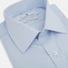 View 2 of product The Light Blue Mayfair Shirt by Turnbull & Asser is a men's cotton dress shirt featuring a pointed collar and button-down front, shown flat on a white background.
