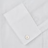 View 4 of product The Die Another Day Inspired Voile Dress Shirt by Turnbull & Asser features a white pleated front, button-down closure, and classic collar—laid flat on white to showcase its timeless James Bond style.