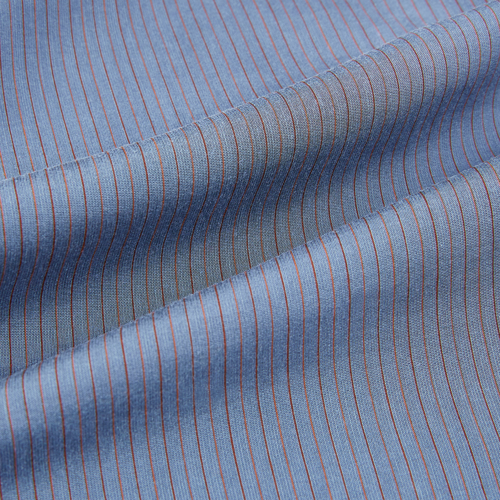 A neatly folded men's Mid Blue Red Stripe Regular Fit Mayfair Shirt by Turnbull & Asser, featuring long sleeves, classic collar, white buttons, and subtle red stripes—a hallmark of the brand’s renowned luxury.