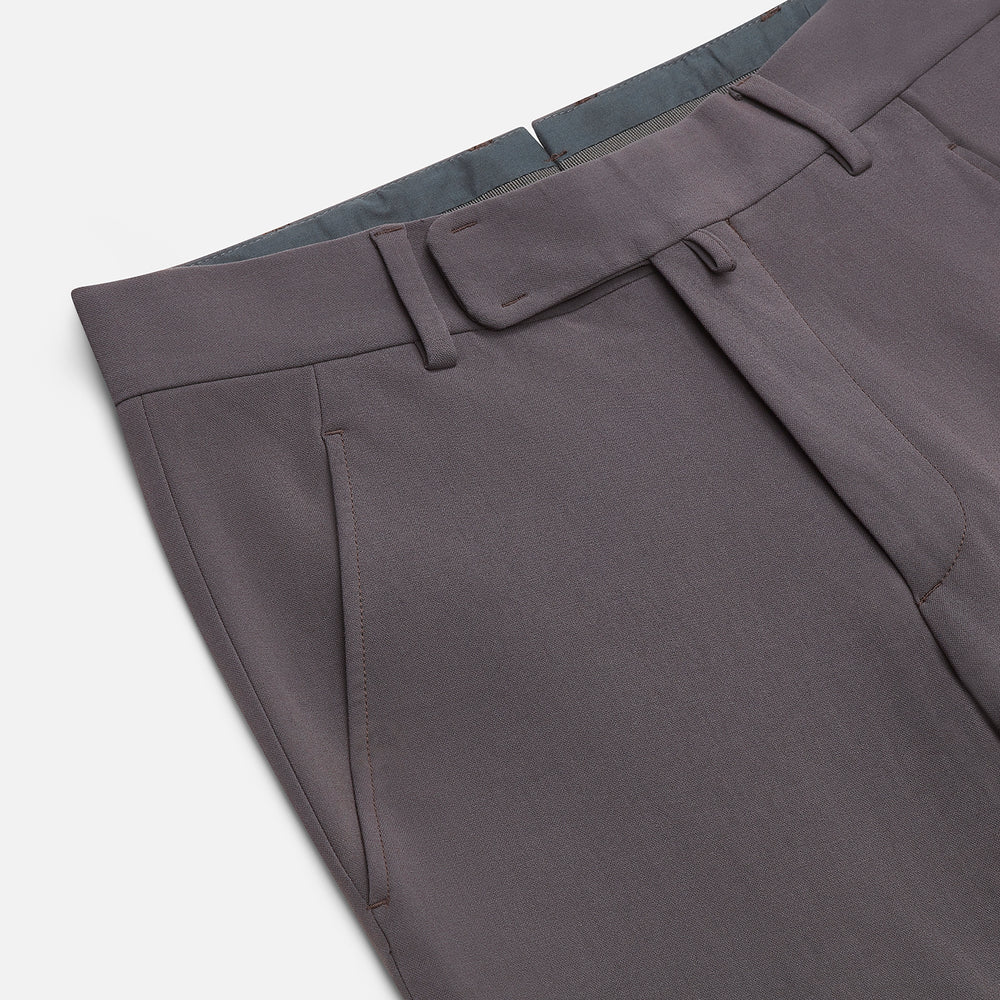 The Charcoal James Trouser by Turnbull & Asser features a straight-leg cut, belt loops, side pockets, and a front zipper—expertly tailored for elegant versatility, shown on a plain white background.