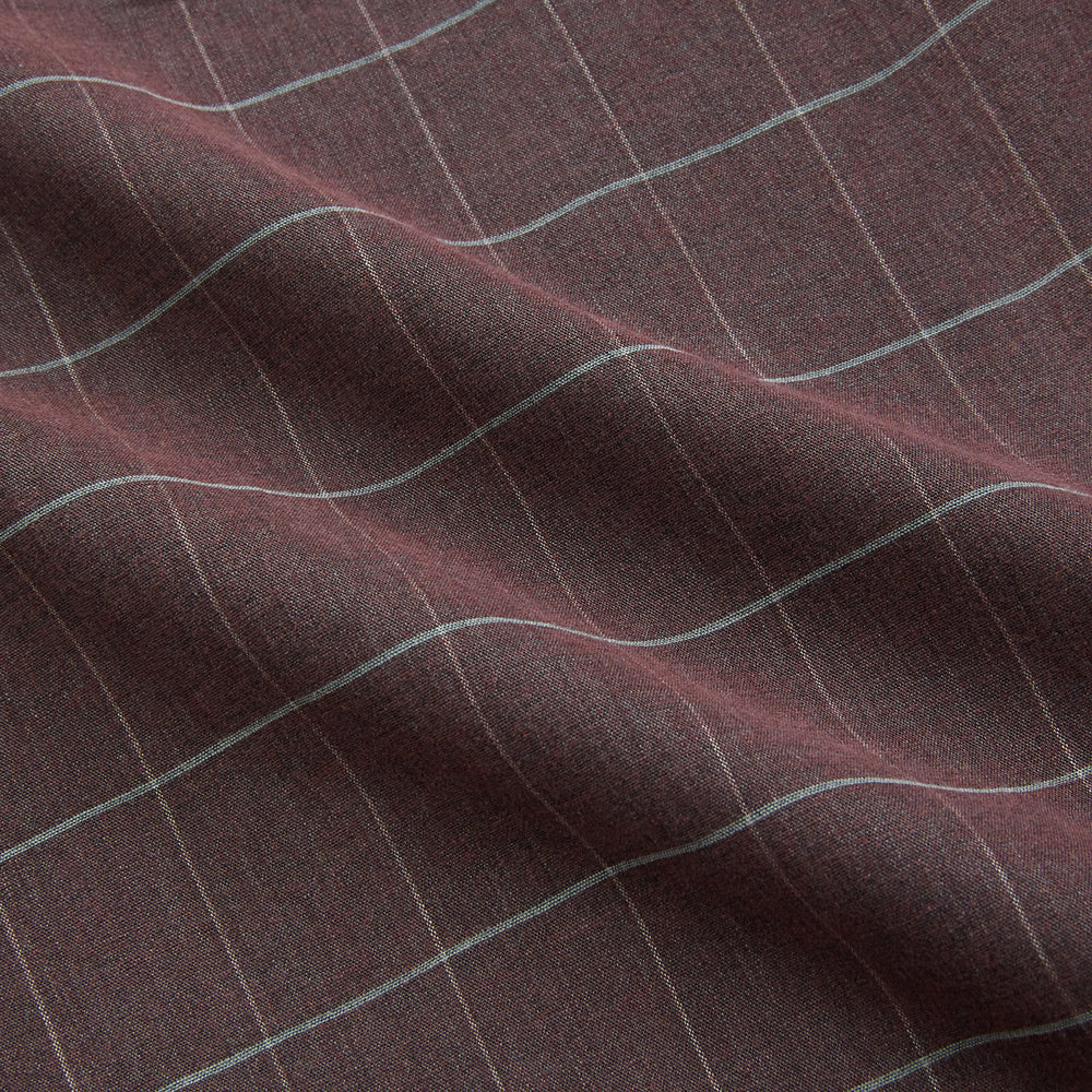 The Turnbull & Asser Burgundy Check Hampstead Overshirt, featuring a button-up front, collar, white windowpane pattern, and two front pockets, is laid flat on a white background—perfect for elegant formal wear.